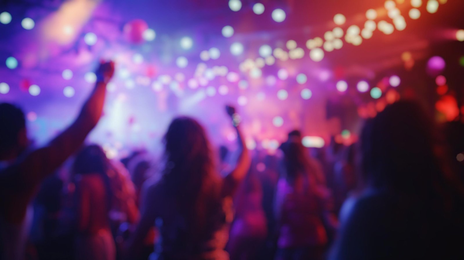 Blurred background of a vibrant crowd enjoys a lively festival atmosphere, dancing and celebrating under dazzling lights. the scene captures the joy and energy of a memorable event.